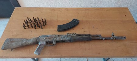 Keçmiş məhkumdan "Kalaşnikov" götürüldü